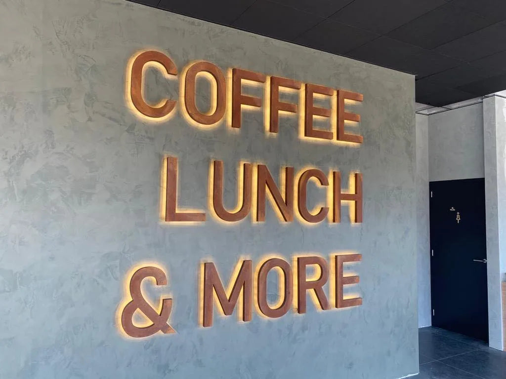 Backlit LED letters on an interior wall