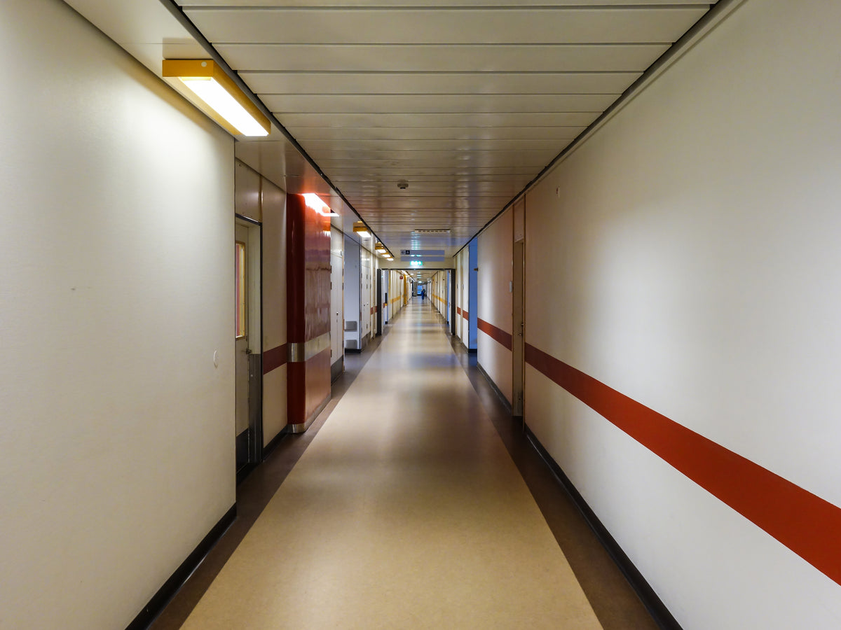 Hospital corridor with ceiling lighting