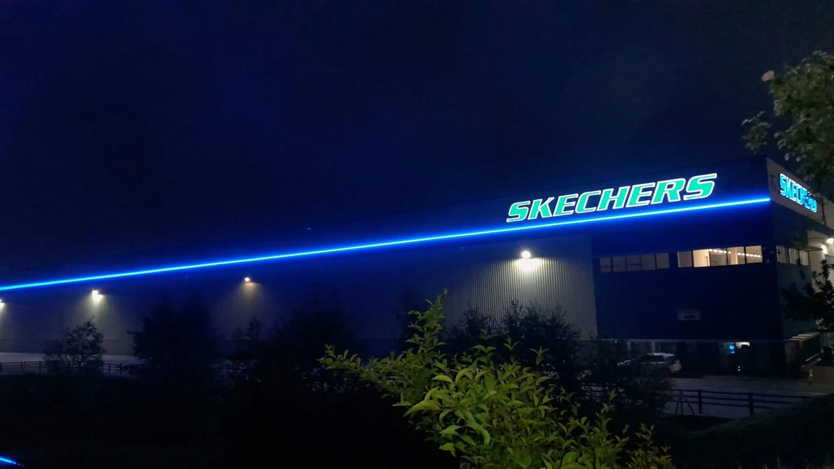 Skechers distribution centre facade lit at night