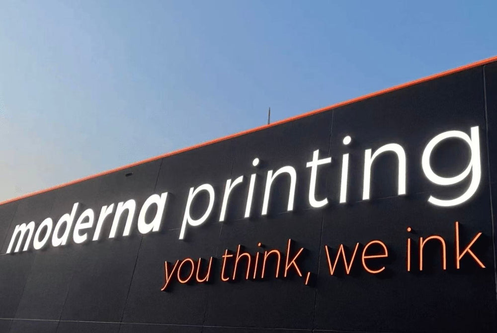 Illuminated LED facade sign for Moderna Printing