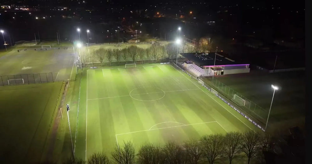Patro Eisden Maasmechelen pitches at night with LED floodlights